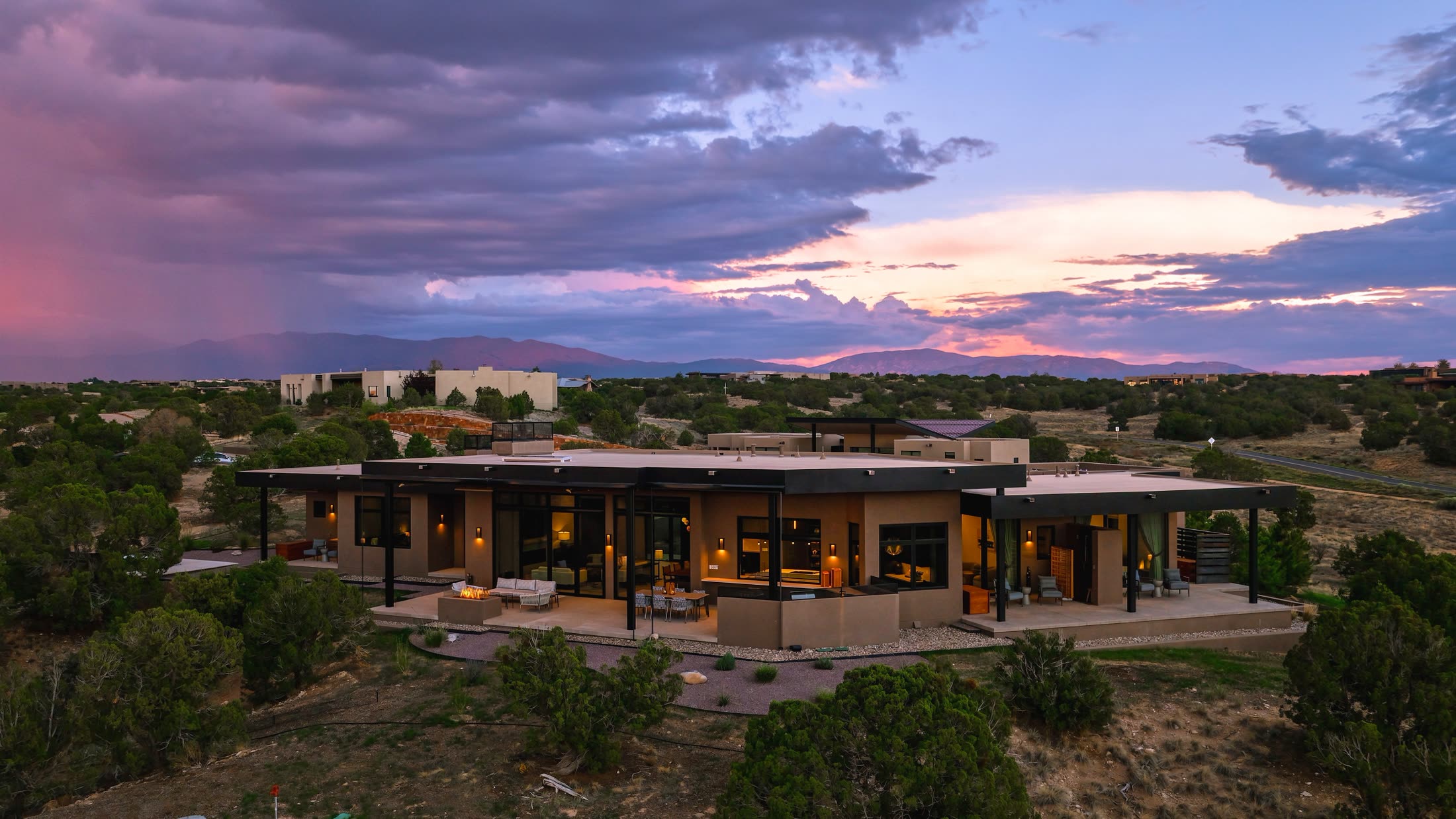 Zen by Prull Custom Builders at dusk with the Sangre de Cristo mountains behind
