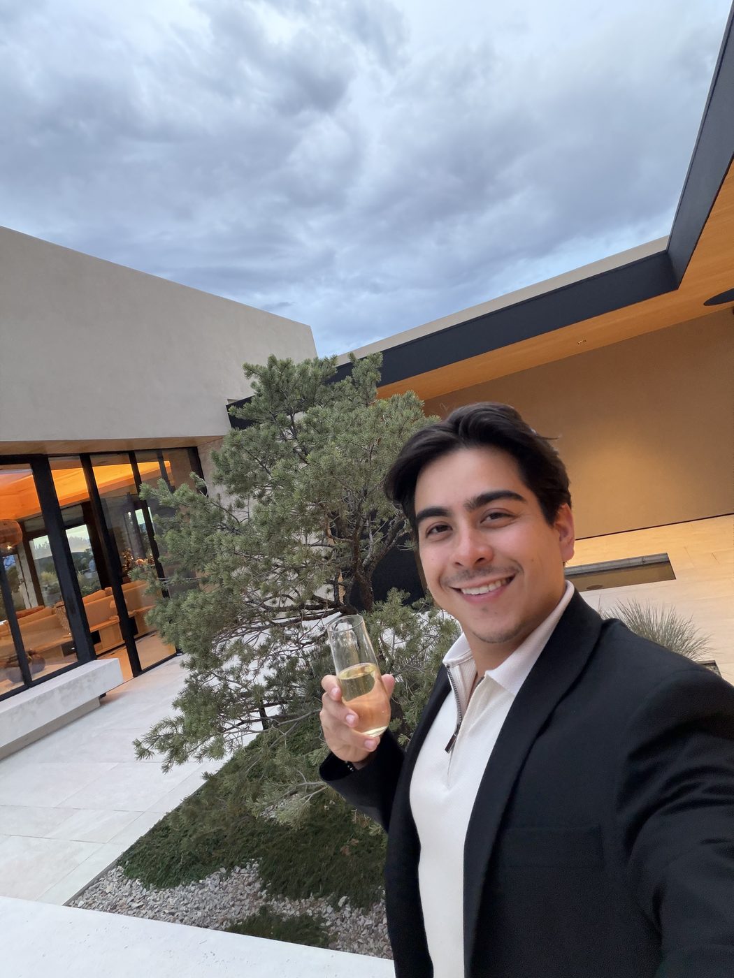 Aram Herrera in a modern courtyard
